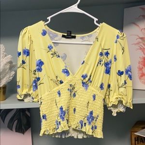 Tight yellow plunge top